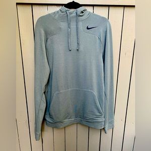 A light gray hooded sweatshirt.